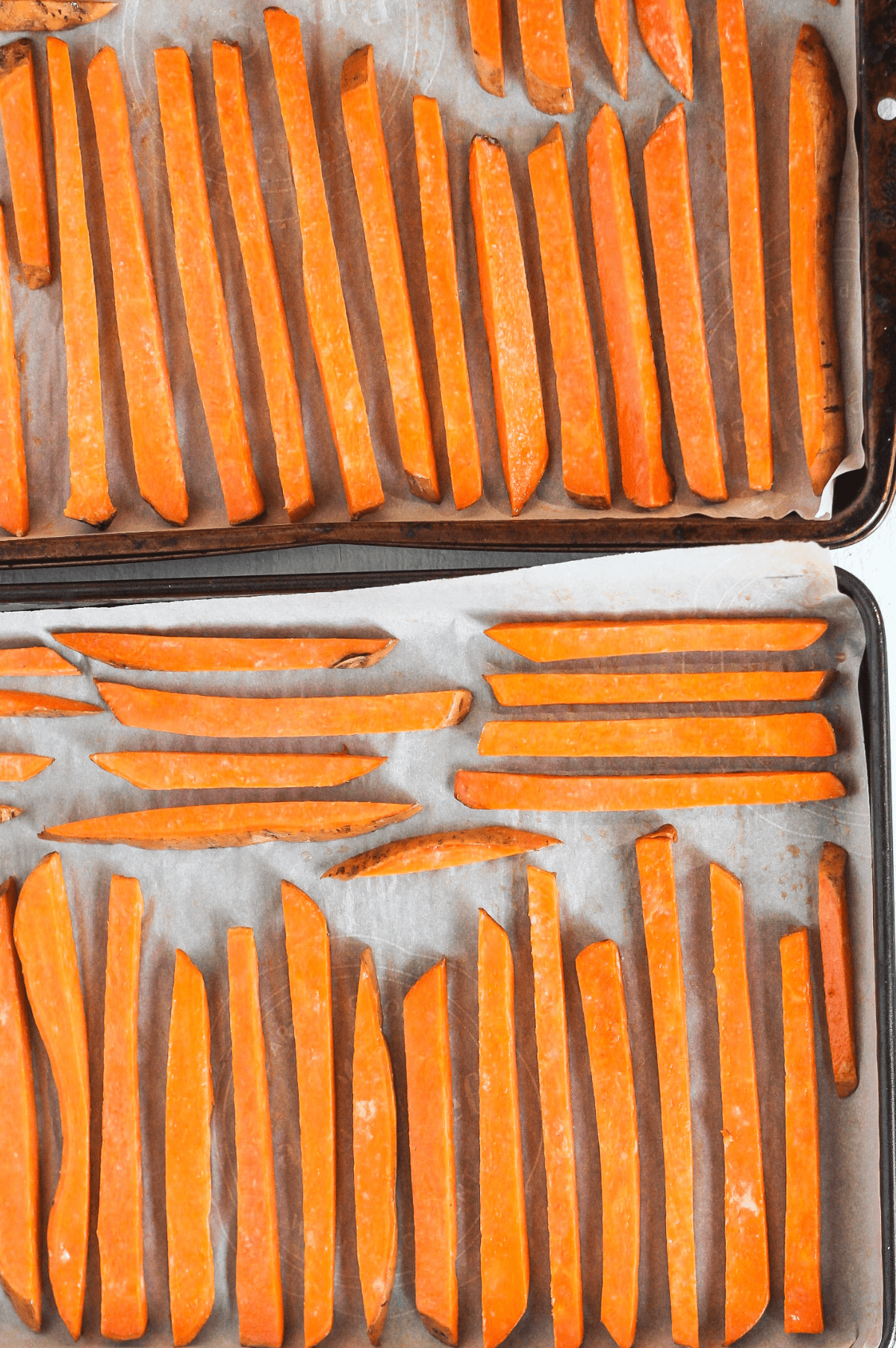 How to Make Crispy Sweet Potato Fries in Your Oven That Aren't Soggy: Sweet Potato Fries on Pan