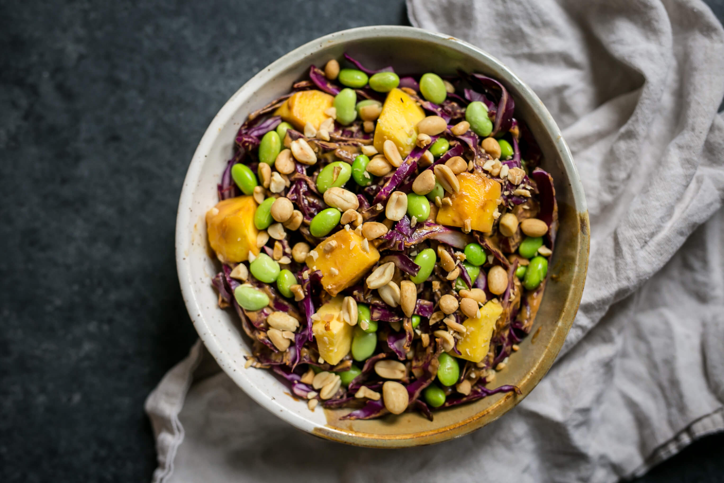 20 Healthy Meals to Help Your Clients Eat Healthy on a Tight Budget: Mango, Edamame & Cabbage Salad with Peanut Sauce
