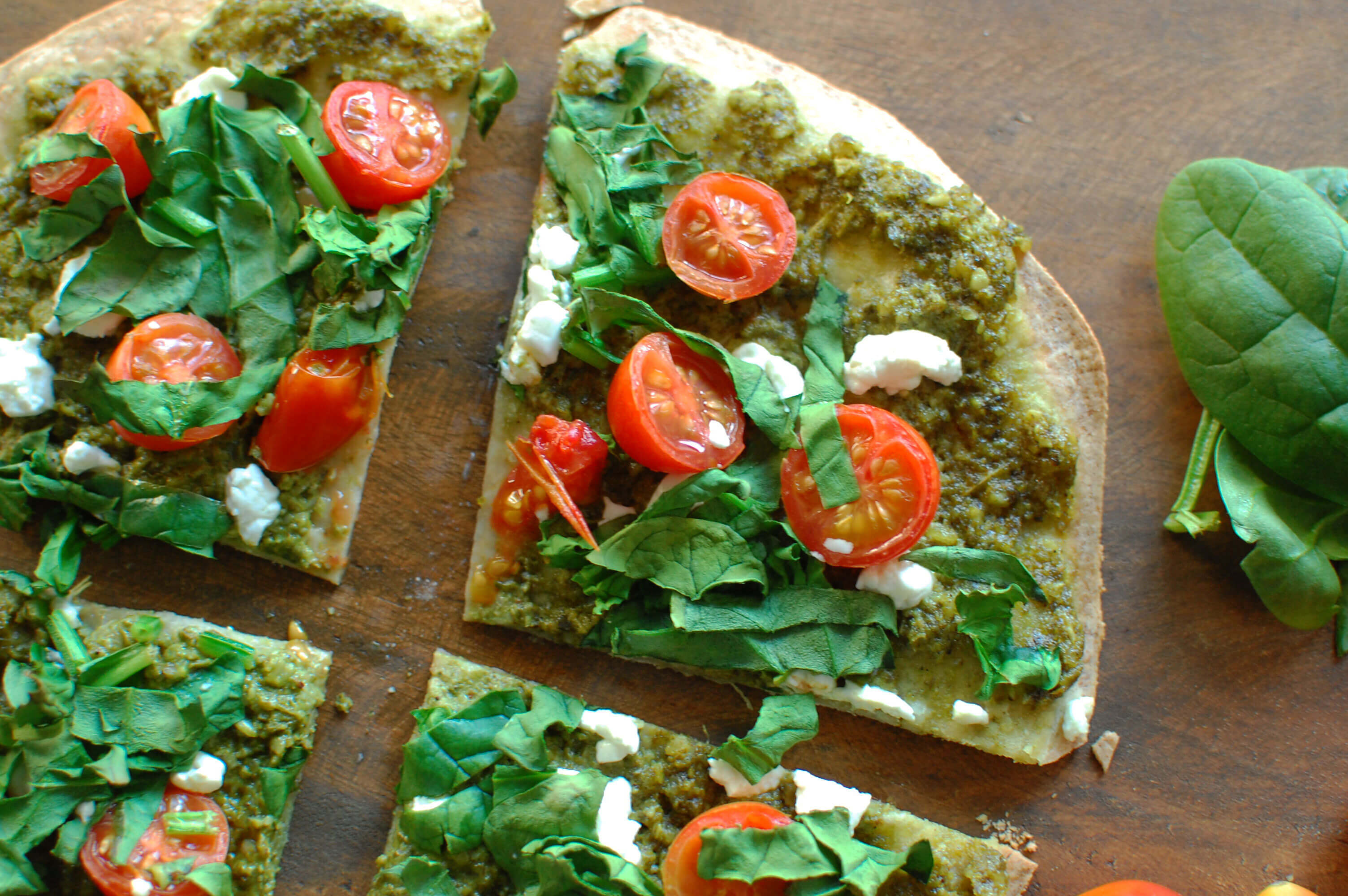 20 Family-Friendly Meals Your Clients Will Love: Spinach, Tomato & Goat Cheese Pizza
