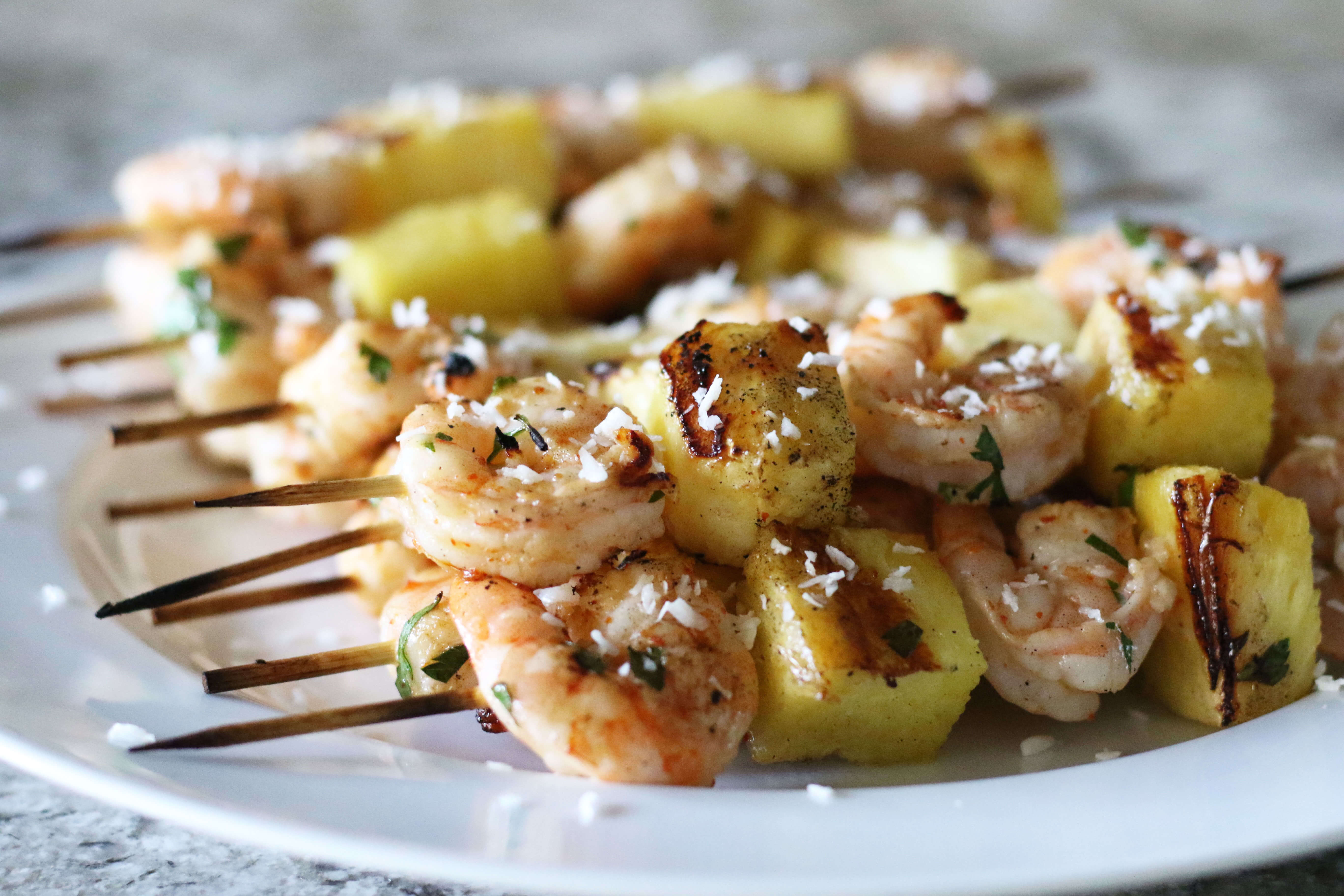 20 Summer-Inspired Meals Your Clients Will Love:Pineapple Coconut Shrimp