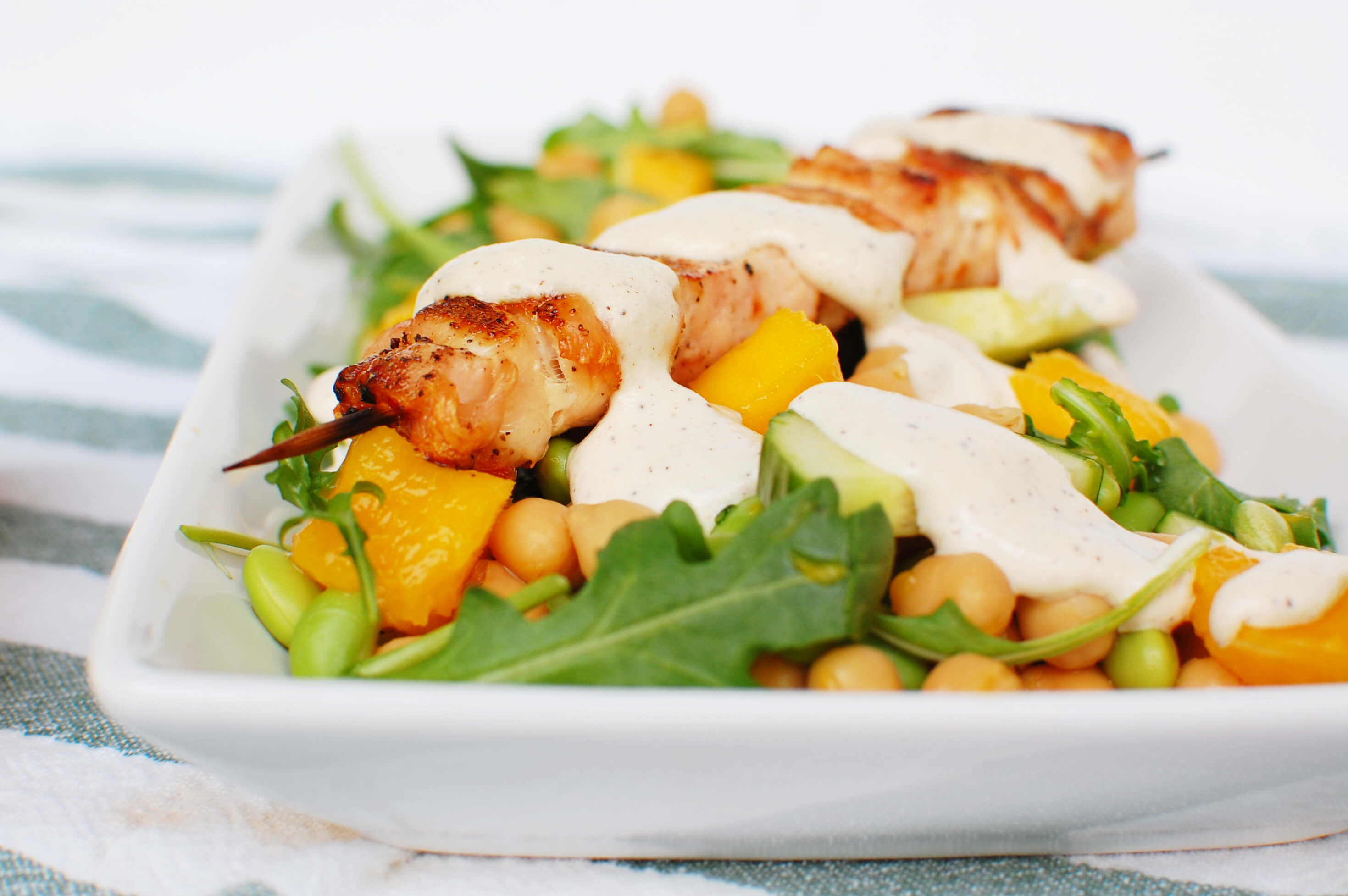 20 Meal Ideas Your Clients Can Grill This Summer: Mango Chickpea Salad with Grilled Chicken Kabobs