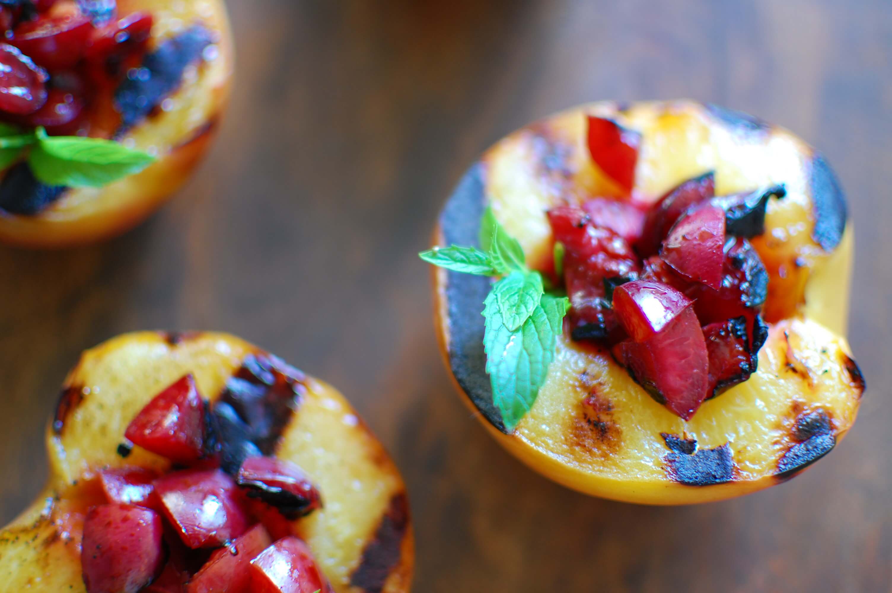 20 Meal Ideas Your Clients Can Grill This Summer: Grilled Cherry Stuffed Peaches