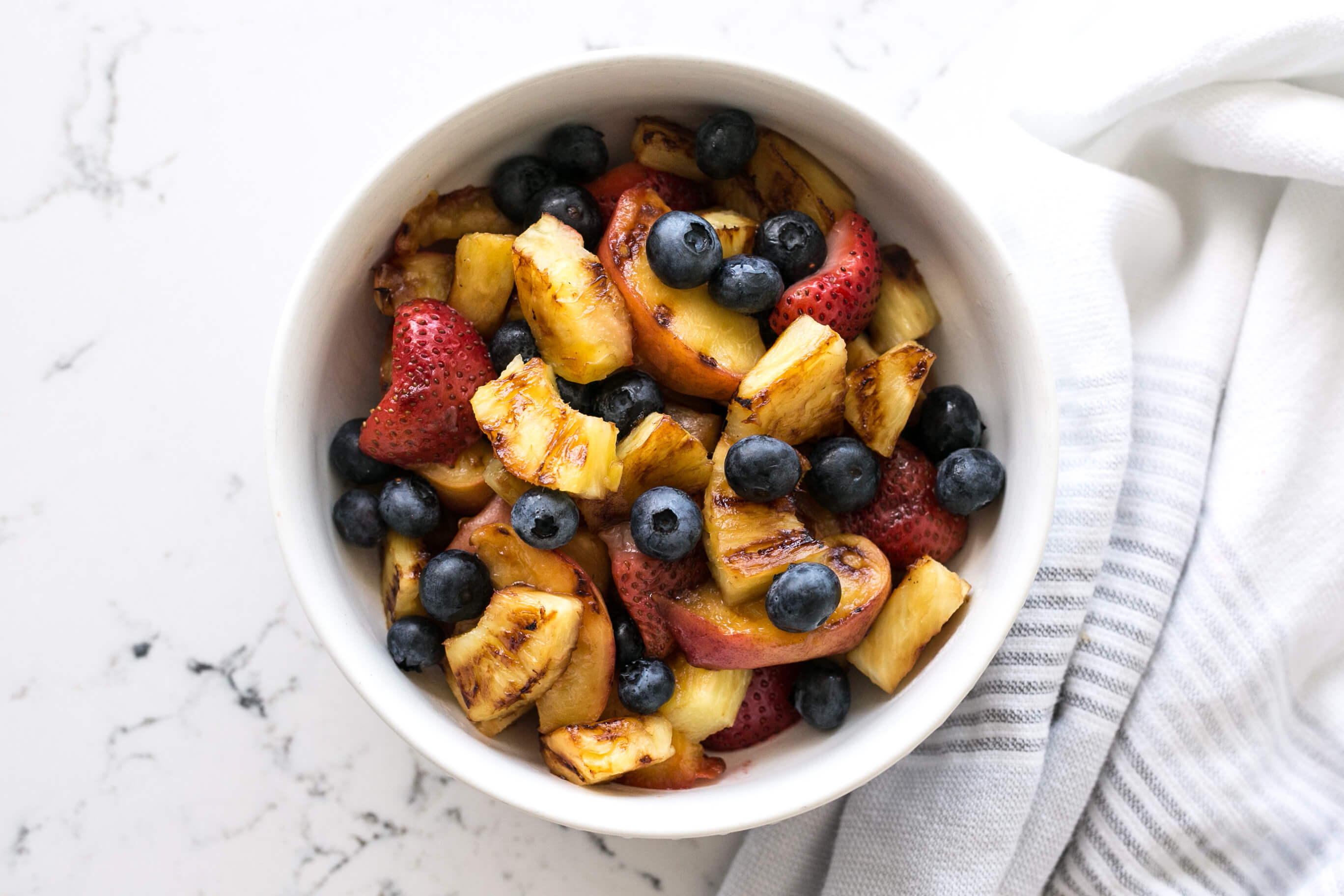 20 Meal Ideas Your Clients Can Grill This Summer: Grilled Fruit Medley