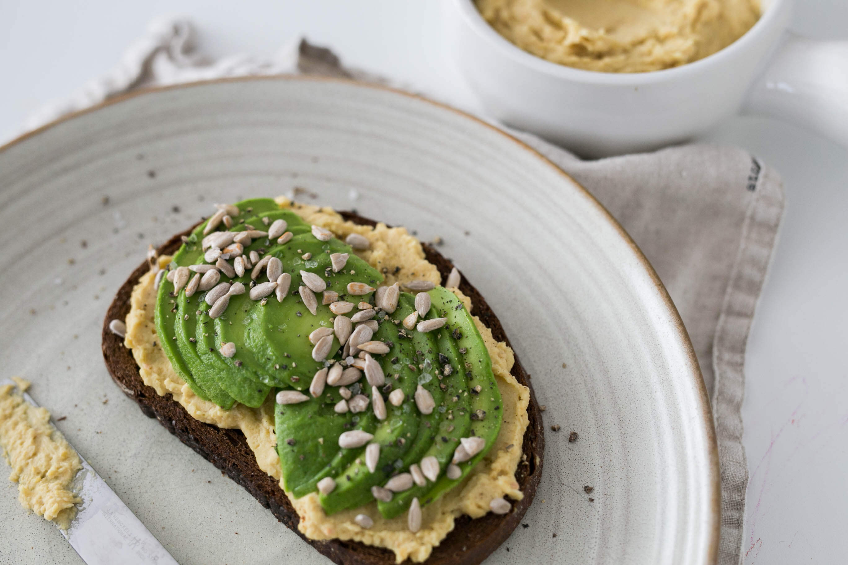 20 Meal Ideas to Help Clients Manage Arthritis: Hummus Toast with Avocado